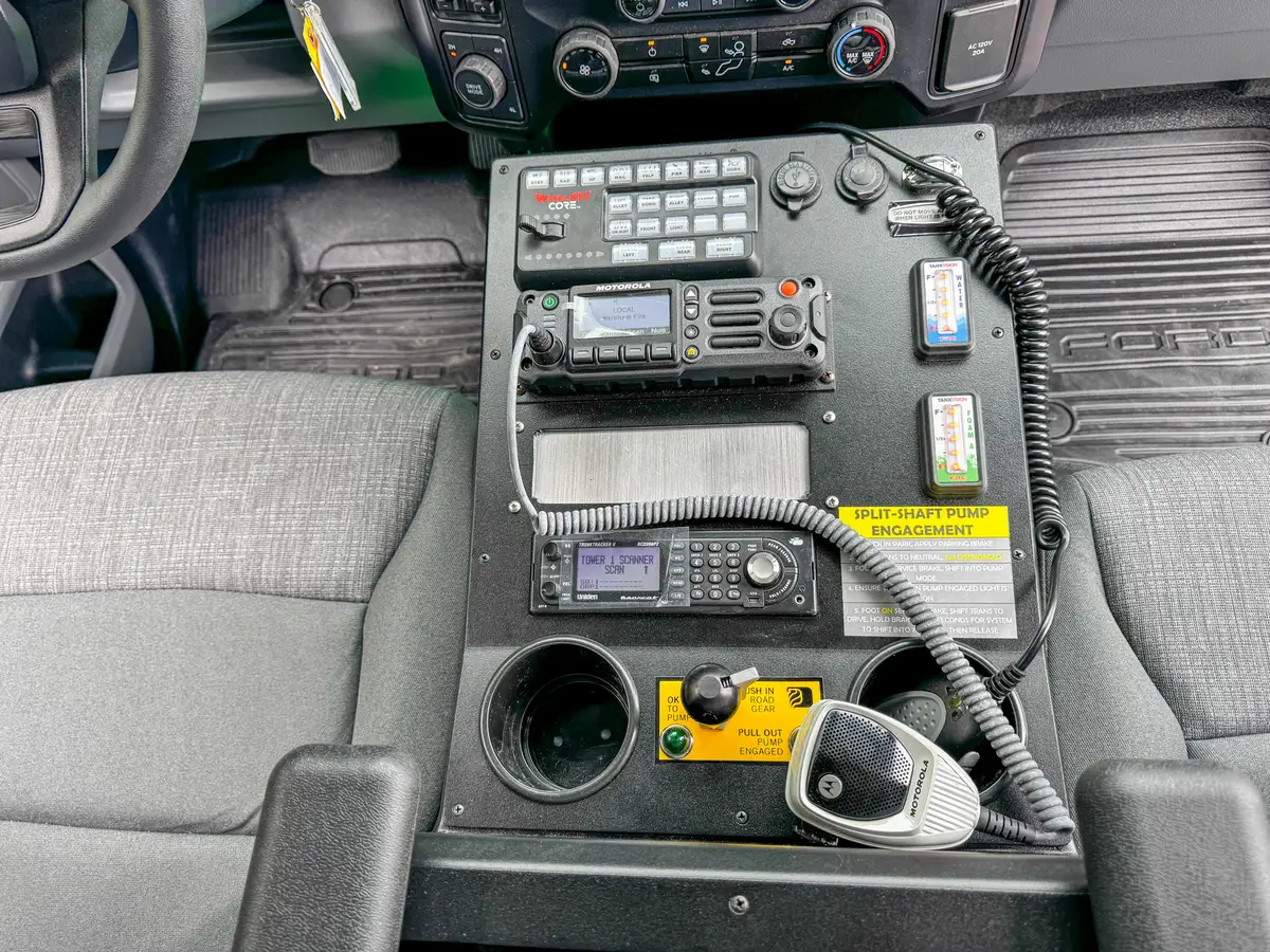 Whelen control-pad close-up showing emergency-light and siren function buttons.